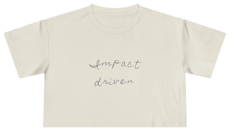 Impact Driven — Back Story Crop Tee